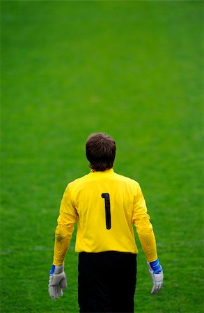 soccer goalie hands - Soccer goalie waits for ball to come downfield. Shot from behind goalie. Stock Photo - Budget Royalty-Free & Subscription, Code: 400-05063166