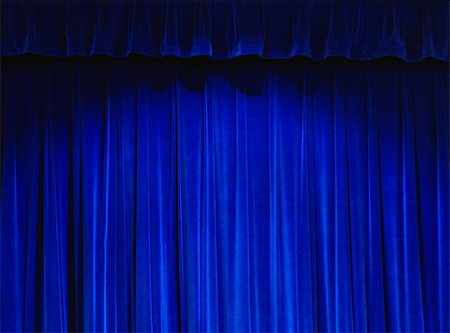 simsearch:400-04452784,k - Blue Theater Curtain With Spot Light on Stock Photo - Budget Royalty-Free & Subscription, Code: 400-05063698