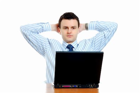 Thoughtful businessman sitting behind the computer Stock Photo - Budget Royalty-Free & Subscription, Code: 400-05063781