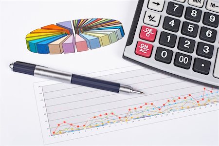 simsearch:400-03962284,k - Calculator and pen on market business financial chart background. Shallow depth of field Stock Photo - Budget Royalty-Free & Subscription, Code: 400-05074354