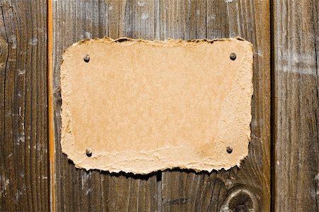 Torn Cardboard On Wooden Wall. Ready For Your Message. Stock Photo - Budget Royalty-Free & Subscription, Code: 400-05074897