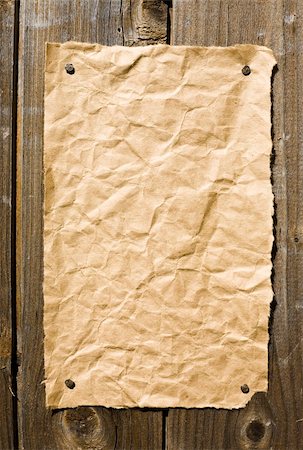 Old Paper On Dark Wooden Texture. Ready For Your message. Stock Photo - Budget Royalty-Free & Subscription, Code: 400-05074903