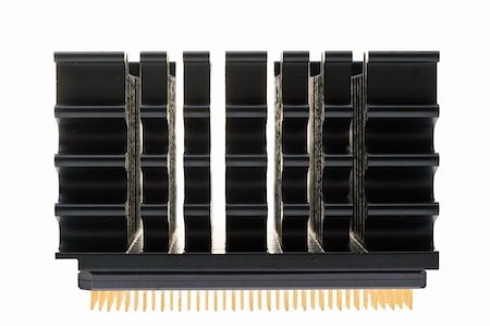 A black heat sink atop a silicon microprocessor, designed to keep the hot chip cool. Stockbilder - Microstock & Abonnement, Bildnummer: 400-05075103