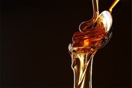 simsearch:400-04865454,k - Honey flowing out of the spoon stock photo Stockbilder - Microstock & Abonnement, Bildnummer: 400-05075350