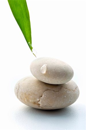 bamboo leav, water drop  and stones isolated on white Photographie de stock - Aubaine LD & Abonnement, Code: 400-05075425