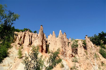 stalagmite - Djavolja Varos (Devils Town) national park in Serbia, one of the new 7 wonders of the world Stock Photo - Budget Royalty-Free & Subscription, Code: 400-05075779