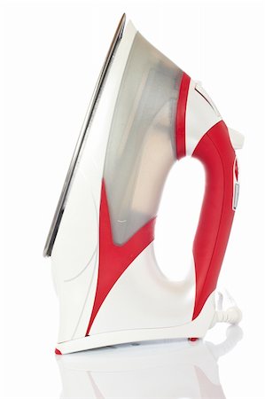 simsearch:400-04019890,k - Red electric iron reflected on white background Stock Photo - Budget Royalty-Free & Subscription, Code: 400-05075954