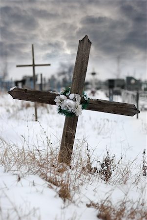Cross on a cemetery. The drama sky on a background Stock Photo - Budget Royalty-Free & Subscription, Code: 400-05076584