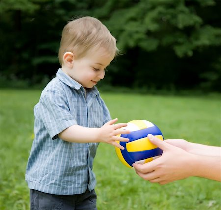 The Little Child And A Ball Stock Photo - Budget Royalty-Free & Subscription, Code: 400-05076925