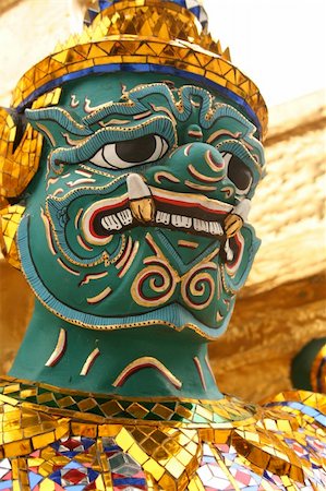 emerald buddha - Wat Phra Sri Rattana Satsadaram, known as Wat Phra Kaew, is The Temple of the Emerald Buddha in Bangkok, Thailand, Asia. Details of the Ramakien' staue. Stock Photo - Budget Royalty-Free & Subscription, Code: 400-05077083