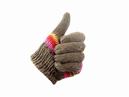 snow cosy - bright knitted gloves with thumb up. Isolated Stock Photo - Budget Royalty-Free & Subscription, Code: 400-05077210
