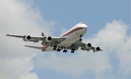 simsearch:400-04461341,k - Heavy Boeing jumbo jet approaching with gear down Stock Photo - Budget Royalty-Free & Subscription, Code: 400-05077424