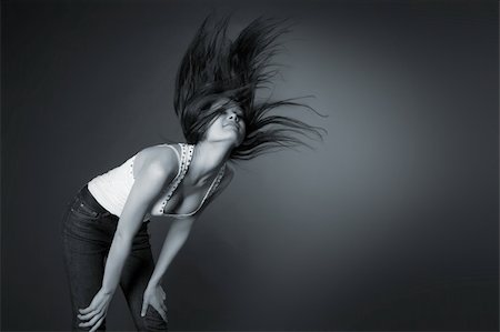 Beautiful girl shaking her head isolated in studio Stock Photo - Budget Royalty-Free & Subscription, Code: 400-05077459