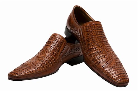 simsearch:400-05317494,k - Brown low shoes on a white background Photographie de stock - Aubaine LD & Abonnement, Code: 400-05078678