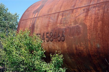 rusting tank - The old railway tank worth on the ground. Stock Photo - Budget Royalty-Free & Subscription, Code: 400-05079244