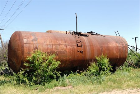 rusting tank - The old railway tank worth on the ground. Stock Photo - Budget Royalty-Free & Subscription, Code: 400-05079243