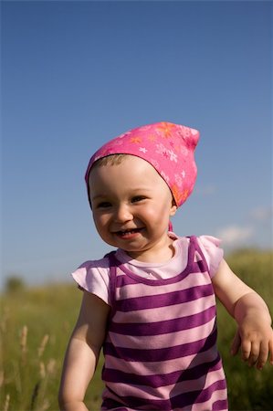 simsearch:400-04067084,k - active baby girl on meadow Stock Photo - Budget Royalty-Free & Subscription, Code: 400-05079655