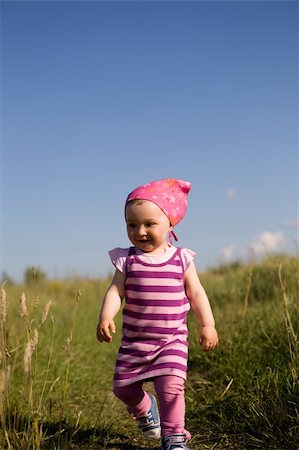 simsearch:400-04067084,k - active baby girl on meadow Stock Photo - Budget Royalty-Free & Subscription, Code: 400-05079656