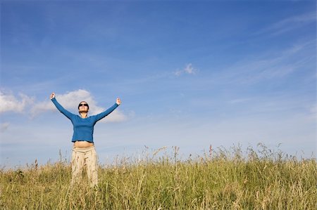 attractive brunette woman relaxing on sky background Stock Photo - Budget Royalty-Free & Subscription, Code: 400-05079651