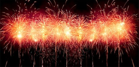 sparking light in sky - Digitally enhanced firework.  Red row of rockets. Banner (panorama) format. Stock Photo - Budget Royalty-Free & Subscription, Code: 400-05079792