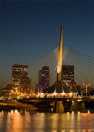 dragon_fang (artist) - View of Winnipeg skyline and Provencher Bridge at night, with reflections in the river Stock Photo - Budget Royalty-Free & Subscription, Code: 400-05079808