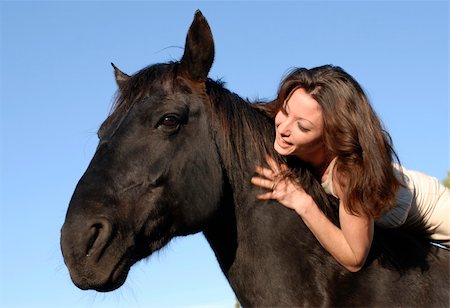 simsearch:400-04660370,k - young woman and her best friend black stallion Photographie de stock - Aubaine LD & Abonnement, Code: 400-05070219