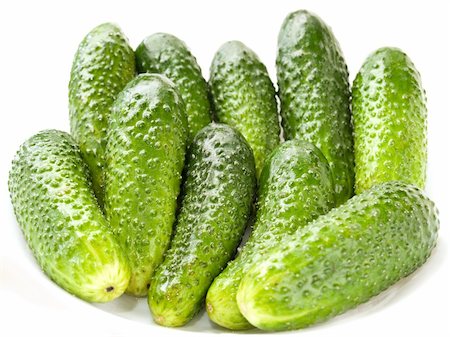 dragunov (artist) - The fresh cucumbers isolated on white Photographie de stock - Aubaine LD & Abonnement, Code: 400-05070210