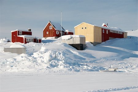 An inuit village with warehouses in a snowy landscape Stock Photo - Budget Royalty-Free & Subscription, Code: 400-05070266