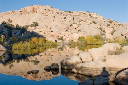 simsearch:400-04066006,k - Barker Dam is a water-storage facility located in Joshua Tree National Park in California. The dam was constructed by early cattlemen, and is situated between Queen Valley and the Wonderland of Rocks near the Wall Street Mill. Fotografie stock - Microstock e Abbonamento, Codice: 400-05070833