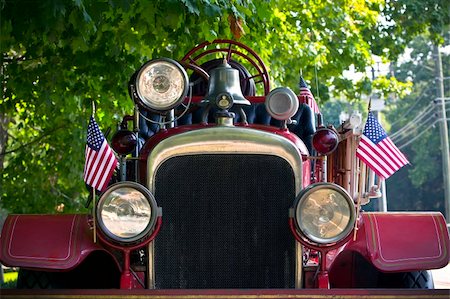 first responder - American flag on an antique fire truck preparing for a patriotic holiday parade. Stock Photo - Budget Royalty-Free & Subscription, Code: 400-05070850