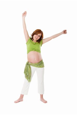 simsearch:400-04389562,k - Beautiful pregnant woman on white enjoying this wonderful moment Stock Photo - Budget Royalty-Free & Subscription, Code: 400-05070976