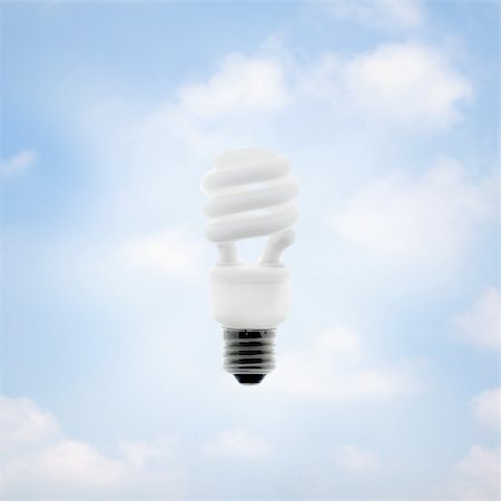 simsearch:400-04127334,k - Energy saving bulb on a bright sky background. Photographie de stock - Aubaine LD & Abonnement, Code: 400-05071160
