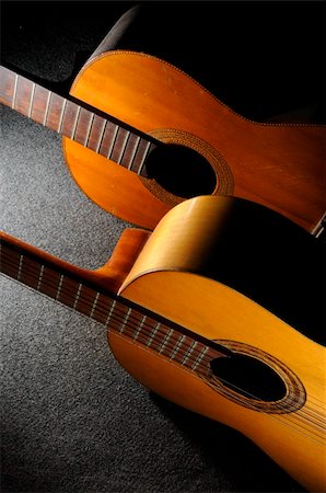 shadow acoustic guitar - Detail of two acoustic guitars - still life Stock Photo - Budget Royalty-Free & Subscription, Code: 400-05071504