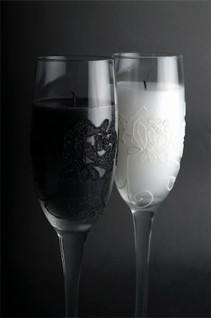 Candles in glasses just blown out, against a black background. Fotografie stock - Microstock e Abbonamento, Codice: 400-05071679