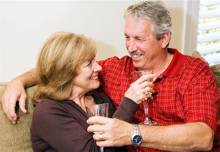 simsearch:400-03972903,k - Beautiful mature couple relaxing together with a glass of wine. Stock Photo - Budget Royalty-Free & Subscription, Code: 400-05071739