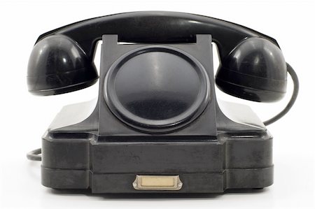 The old telephone of black colour on a white background. Foto de stock - Royalty-Free Super Valor e Assinatura, Número: 400-05071859