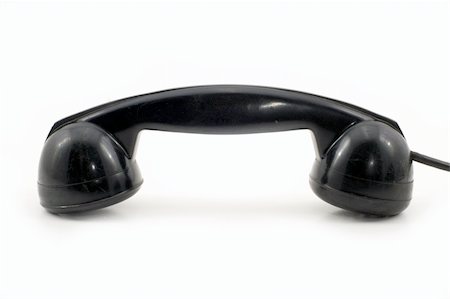 The old telephone of black colour on a white background. Foto de stock - Royalty-Free Super Valor e Assinatura, Número: 400-05071860