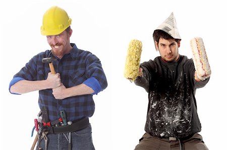 simsearch:400-06797091,k - construction worker with hammer and house painter in style cow-boy with paint roller Fotografie stock - Microstock e Abbonamento, Codice: 400-05071904