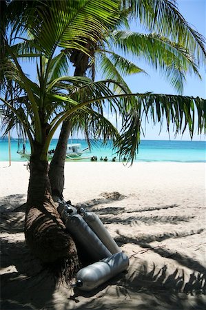 scuba tanks under palms tree on boracay beach in the philippines Stock Photo - Budget Royalty-Free & Subscription, Code: 400-05072036