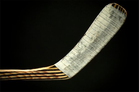 Wooden hockey stick on black background Stock Photo - Budget Royalty-Free & Subscription, Code: 400-05072563