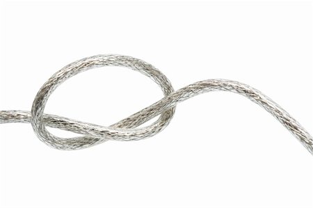 simsearch:400-05078674,k - Wire fastened in the knot on a white background Fotografie stock - Microstock e Abbonamento, Codice: 400-05073219