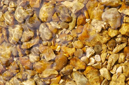 simsearch:625-02927144,k - pebbles under a stream of clear flowing water Photographie de stock - Aubaine LD & Abonnement, Code: 400-05073773