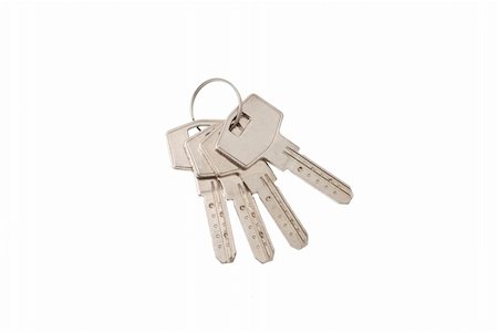 simsearch:400-07338365,k - Bunch of new mosern iron keys on white background 4 Fotografie stock - Microstock e Abbonamento, Codice: 400-05085036