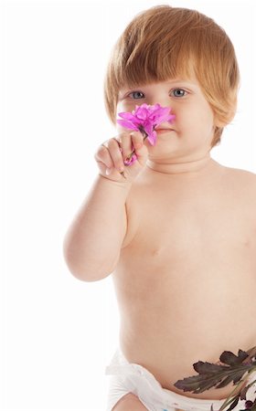 diaper toddler portraits - Portrait of a baby girl smelling  a flower Stock Photo - Budget Royalty-Free & Subscription, Code: 400-05085433