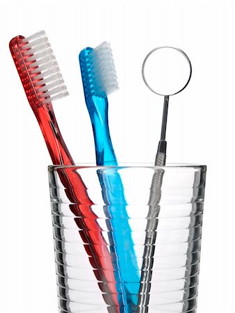 simsearch:400-04552289,k - Two toothbrush and a mouth mirror in a glass. Foto de stock - Super Valor sin royalties y Suscripción, Código: 400-05085818