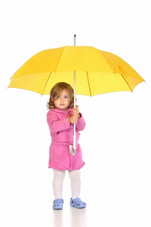 rain little girl - beauty a little girl with yellow umbrella Photographie de stock - Aubaine LD & Abonnement, Code: 400-05085856