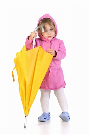 rain little girl - beauty a little girl with yellow umbrella Photographie de stock - Aubaine LD & Abonnement, Code: 400-05085860