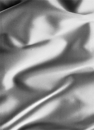 simsearch:630-02220514,k - black satin background. A satiny fabric with beautiful light-shadow waves Stockbilder - Microstock & Abonnement, Bildnummer: 400-05086801
