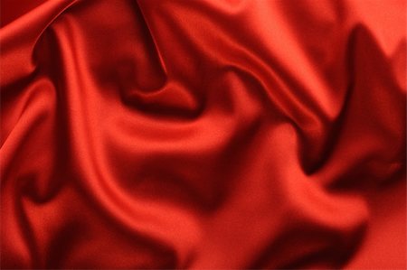 flowing garments - red satin background. A satiny fabric with beautiful light-shadow waves Stock Photo - Budget Royalty-Free & Subscription, Code: 400-05086816