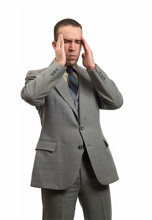 simsearch:400-05363701,k - A businessman getting a headache from all the mental stress he is having Stock Photo - Budget Royalty-Free & Subscription, Code: 400-05086951